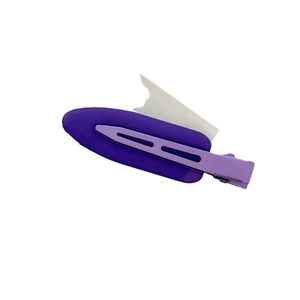 Rainbow matte seamless hair clip in purple gradient for fringe positioning and styling