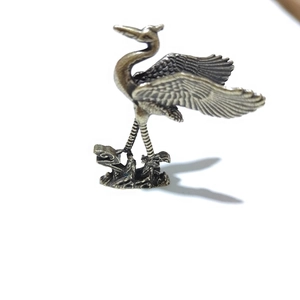 Vintage brass flying crane desk ornament with detailed feather texture and antique finish