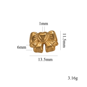 Detailed view of golden stainless steel bow bead showing precise 13.5mm by 11.5mm dimensions