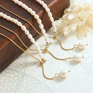 Elegant freshwater pearl necklace with gold-plated snake chain and adjustable bead clasp