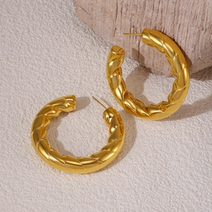 Modern gold-plated titanium steel C-shaped hoop earrings with twisted geometric texture