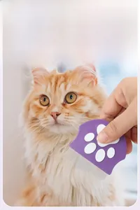 Macro shot of purple pet flea comb grooming long-haired cat's neck fur with metal teeth