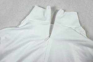 Detail showing the mock neck and high-quality invisible zipper on the white bodysuit