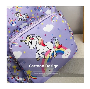Detail of purple toddler backpack featuring colorful unicorn and rainbow cartoon patterns