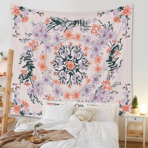 Detailed shot of bohemian mandala tapestry hanging above a bedroom headboard
