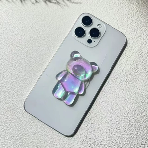 3D holographic bear phone socket grip made of transparent acrylic on a smartphone