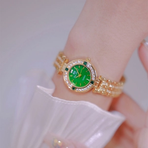Elegant gold women's quartz watch with green dial and rhinestones on metal strap