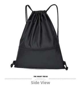 Detail view of black drawstring backpack with diamond grid texture and front zipper pocket