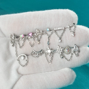 Parure de boucles d'oreilles papillon en argent avec étoiles, cœurs et zircons