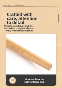 Detail view of natural beech wood handle with smooth finish on a silicone spatula