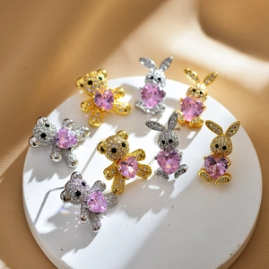 Zircon-studded bear and rabbit stud earrings with pink heart stones in gold and silver