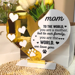 Close-up of heart-shaped gold and white acrylic Mother’s Day plaque with emotive quote