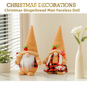 Pair of festive gingerbread Christmas gnomes with plaid vests on a cozy window sill