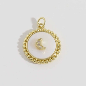 18K gold plated round pendant featuring a crescent moon with pavé zircons and shell inlay