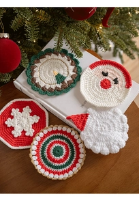 Detailed view of handmade crochet Christmas coasters with festive holiday patterns
