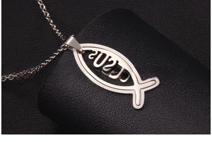 Detail of Jesus fish hollow pendant made of polished silver stainless steel