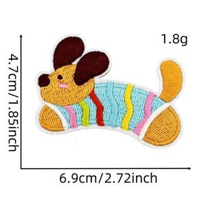 Detailed view of yellow puppy embroidery patch with size markers 4.7cm x 6.9cm
