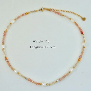 Detail view of pearl and crystal beaded necklace with 11g weight and 40cm length labels