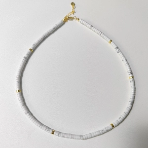 Minimalist natural marble stone necklace with gold spacers and heart charm extension