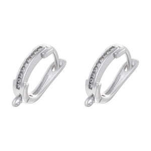 Close-up of silver-plated U-shaped earring hooks with pave zircons and hanging loops