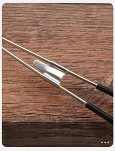 Detailed close-up showing the stable reinforcement of the stainless steel ice clip handle