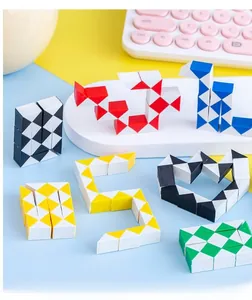 Multi-color twist puzzle snakes shaped into hearts and swans on a bright creative display