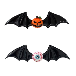 Halloween bat wing hair clips featuring spooky pumpkin and bloodshot eyeball motifs