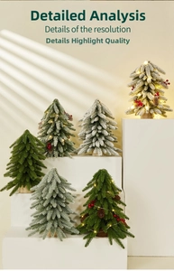 Detailed view of mini Christmas trees with LED lights, pine cones and snow on wood bases