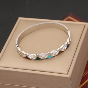 Silver evil eye bracelet with colorful enamel fan shapes and white zircon accents