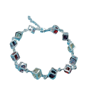 Silver-toned bracelet with 12 cube pendants featuring colorful square-cut gemstones