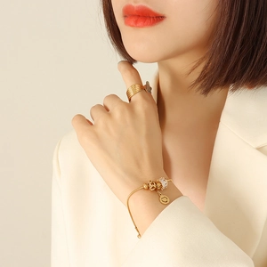 18K gold-plated adjustable snake chain heart bracelet and layered ring set for women