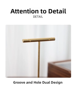 Detail of golden metal T-bar earring display stand with groove and hole dual-hanging design