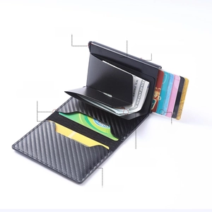 Macro detail of slim carbon fiber wallet featuring RFID blocking and metal skeleton