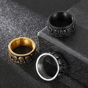 Gothic skull rings for men in gold, black, and silver finishes made of stainless steel