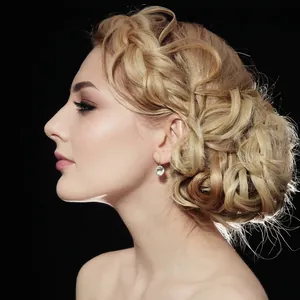 Elegant side view of light golden synthetic braided hair bun for women in French style