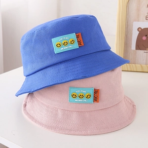 Cappelli alla pescatora per bambini in cotone con patch smiley gialli in blu e rosa