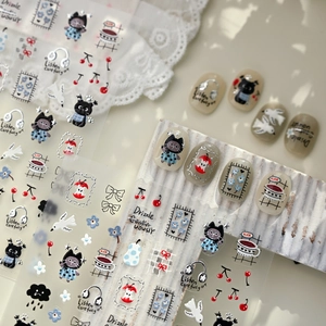 Cute cartoon nail stickers featuring blue skirt cats, red apples and floral patterns