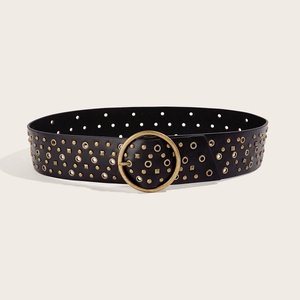 Vintage PU leather belt with gold hollow rings and studs on a beige background