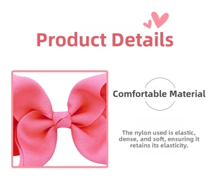 Detail of pink grosgrain ribbon bow featuring soft high-elastic nylon fabric texture