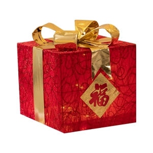 Three-piece red Christmas gift box with gold bow and LED lights for window display