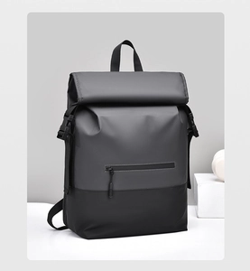Detail of roll-top backpack with waterproof matte fabric and buckle closure