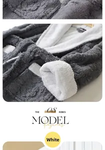Detailed view of high-density white flannel fabric texture on thick winter bathrobe