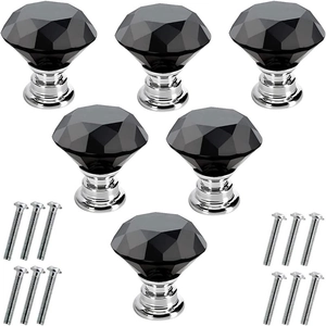 Detail view of six black crystal cabinet knobs with silver base and twelve mounting screws