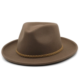 Close-up of brown wool fedora hat featuring a khaki braided decorative band on pure white background