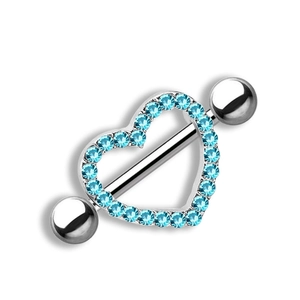 Detail view of heart-shaped nipple ring with sparkling sky blue zircon in silver metal