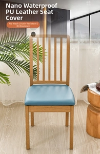 Detail showing waterproof light blue PU leather seat cover on wooden chair in home setting