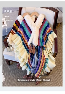 Detail of bohemian knit shawl with colorful wave patterns and white faux fur collar