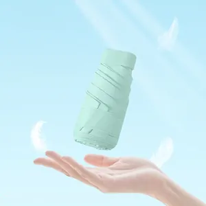 Lightweight portable light green folding sun umbrella with UV protection for women