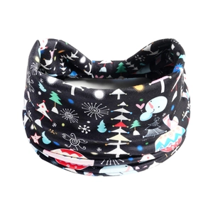 Close-up of wide Christmas headband featuring colorful snowmen and festive patterns