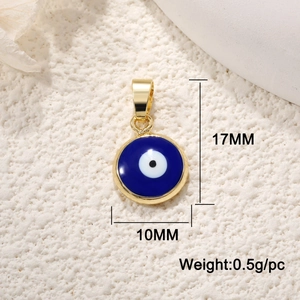 Macro detail of 17x10mm blue Evil Eye pendant with gold trim and weight specifications